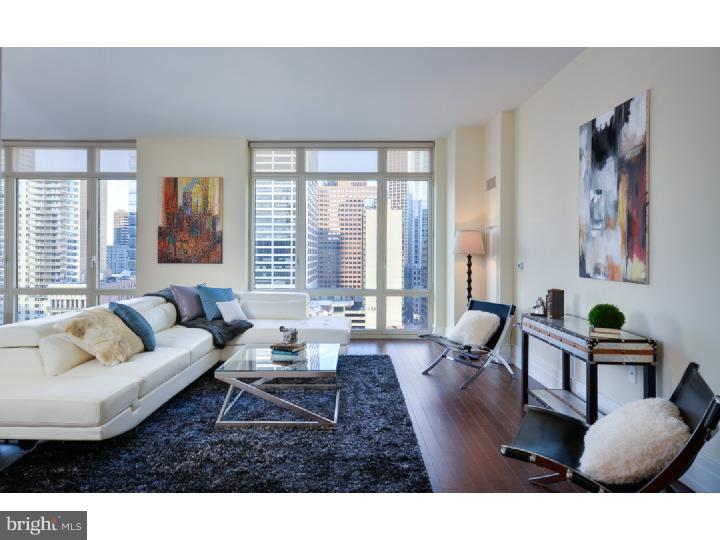 Wonderful opportunity to own a luxurious, 2 bedroom, 2.5 bath residence at 10 Rittenhouse Square, one of the most prestigious buildings in all of Center City. With over 1700 square feet of living space and city views, this unit features an open living room/dining room with floor to ceiling windows, stunning hardwood floors, a beautiful kitchen with all top of the line appliances which include Sub-Zero refrigerator, Miele dishwasher, & Viking Gas Cook Top and stove with granite countertops and large kitchen pantry. The spacious master bedroom suite features large walk in closets and a gorgeous master bathroom with marble bath, separate frameless shower and double sink vanity. 10 Rittenhouse features all the best amenities including 24 hour concierge and doorman service, a chauffeur driven Mercedes, Indoor lap pool, fitness center, yoga room, sauna, and resident lounge with business center, library, wine storage, a catering kitchen and a beautiful landscaped courtyard area. The unit includes 1-car parking in the private garage located in the building, and 9 years remaining on the tax abatement. Come see what 10 Rittenhouse is all about and live at one of the best locations on Rittenhouse Square!