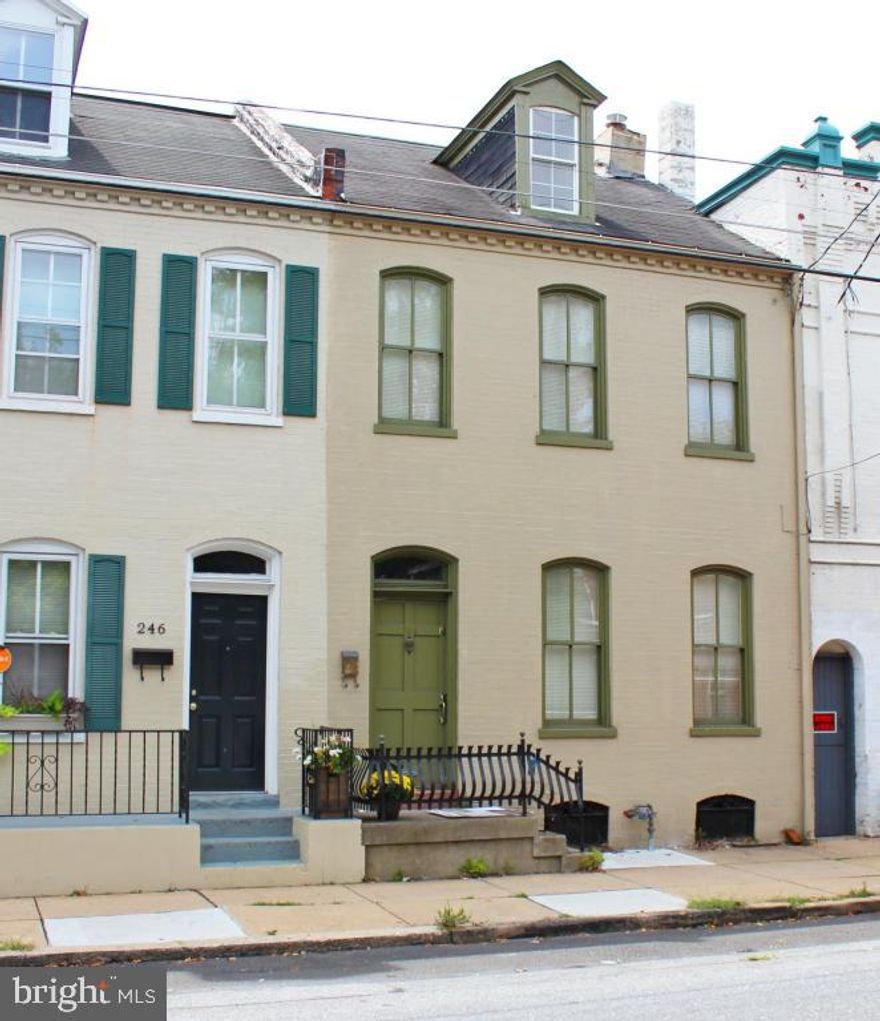 All Fixed up & Ready to go City Townhouse. All Brick, 2.5 Story, has 3 Good Sized Bedroom on Second Floor & 4th Bedroom/Bonus Room on Third Floor. All New Paint & Flooring Throughout. Eat in Kitchen w/ Formal Dining Area too. 9 ft. Ceilings on 1st & 2nd Floors Create a Spacious Feel. Close Downtown Location, less than 4 blocks from LGH. Heating Plant Can be Converted to Gas.