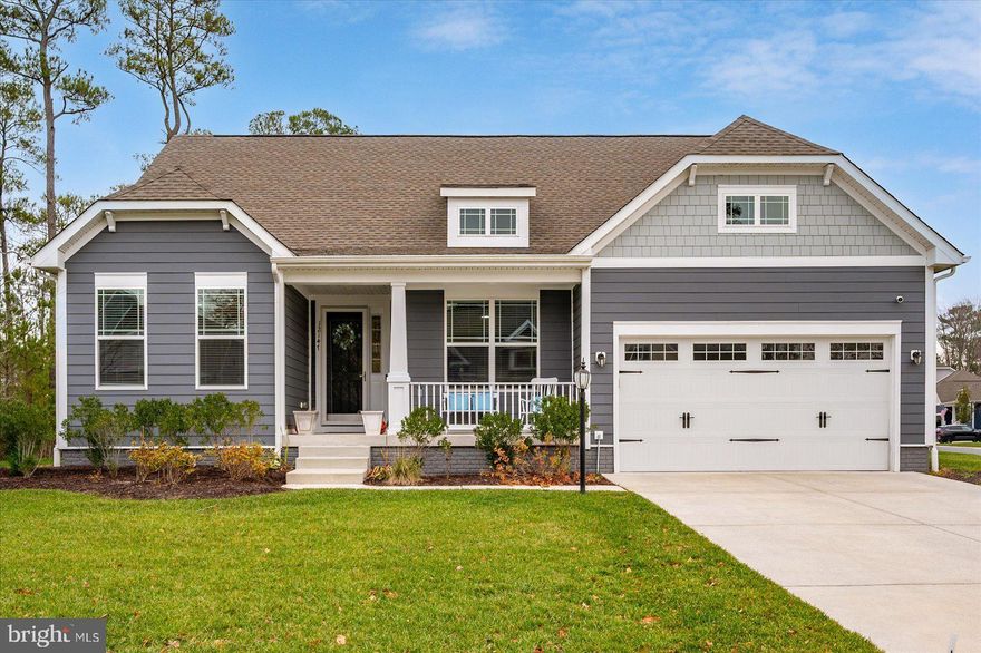 Discover refined coastal living in this beautifully appointed 4-bedroom, 3.5-bath home, ideally positioned on an expansive and private corner lot in the prestigious, amenity-rich community of Glen Riddle. Thoughtfully designed for both everyday comfort and effortless entertaining, this residence offers a seamless blend of style, function, and coastal charm.
An inviting foyer with rich LVP flooring leads to a private office with French doors—perfect for remote work or quiet reading. The main level includes two spacious guest bedrooms, a full hall bath, a convenient powder room, and a well-appointed laundry room.
The luxurious first-floor primary suite offers a serene retreat, complete with a large walk-in closet and a beautifully finished en-suite bath featuring dual vanities and contemporary fixtures.
At the heart of the home, the gourmet kitchen impresses with quartz countertops, stainless steel appliances, double oven, gas range, center island with seating, recessed lighting, and a generous walk-in pantry. This culinary space opens seamlessly to the dining area and expansive family room, creating an inviting open-concept layout ideal for everyday living and hosting family and friends.
A reverse osmosis filtration system provides purified drinking water directly to the kitchen sink via a dedicated RO faucet, with an additional feed line routed to the refrigerator and ice maker for high-quality ice and chilled water.  A whole-home water softening system further enhances water quality throughout the house.
The home is fully networked with dedicated Cat-6 Ethernet lines in all bedrooms and office spaces, delivering true gigabit performance, fiber-ready capability, and support for advanced mesh networking for seamless high-speed coverage throughout the home.
Just off the main living area, a private enclosed nook provides added versatility—perfect as a second office, reading space, craft room, or hobby area. This room also provides convenient interior access to the fully conditioned and encapsulated crawlspace, which features a moisture barrier and integrated HVAC/airflow system. The space remains clean, dry, temperature-controlled, and can be used for extra storage.
Upstairs, a spacious loft offers endless possibilities for a media room, playroom, fitness area, or lounge. The second floor also includes a large fourth bedroom, a full hall bath, and a dedicated storage room.
Outdoor living is equally impressive. A large composite deck and complementary paver patio create the perfect setting for summer cookouts, coastal breezes, and relaxed gatherings. The lush yard is fully irrigated, while the home is equipped with a sprinkler system for added safety. A two-car garage with a Level-2 electric vehicle charging station enhances modern convenience.
Glen Riddle amenities include an outdoor pool, 4 dedicated pickleball courts, a tennis court, fitness center, community center and a marina.  Also on site at Glen Riddle are 2 championship golf courses, War Admiral and Man O'War, and a Ruth's Chris Steak House. This home's great location is convenient to West Ocean City, Berlin, Ocean City beaches and Boardwalk, schools, shopping, and many great restaurants and eateries. This exceptional property delivers the perfect combination of comfort, sophistication, and coastal lifestyle!