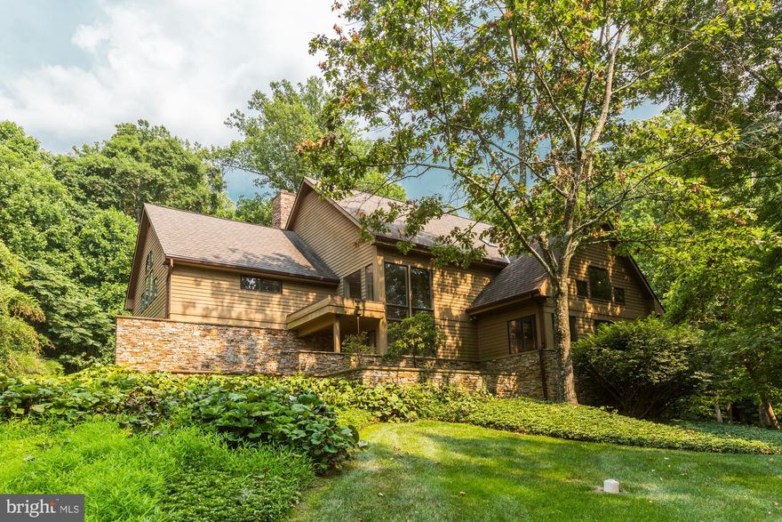 phenomenal custom built property nestled up a private drive in the coveted neighborhood of anton north. sophisticated architectural details, custom lighting, inviting spaces will make you want to call this home. wonderful first floor layout offers two-story foyer opening to the living room with soaring ceilings and dining room adorned with deluxe built-ins. updated eat-in kitchen complete with 5 burner gas cooktop, double wall ovens, separate beverage fridge, two toned cabinetry and island w breakfast bar leads to rear deck. family room off kitchen offers your wood-burning fireplace. mud/laundry room off garage complete your first floor. tranquil primary suite w sitting area, large walk-in and sumptuous ensuite provides separate tub & shower, vanity area and dual sinks. three additional bedrooms, office area and two full baths round out the upper level. heading into the lower level you'll find an amazing theater room including projector, screen & chairs which opens to entertaining space, along with an additional bedroom and full bath, gym/office & storage. great deck and rear yard for the homeowner looking for less maintenance. 2 car garage and ample driveway parking. great location.