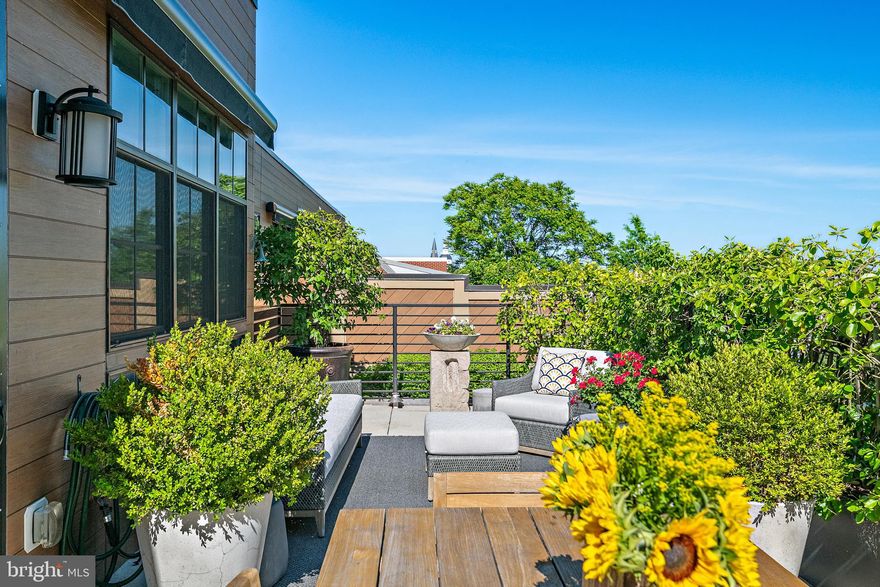 Elegantly appointed penthouse residence in the sought-after 141 West building in the heart of downtown Annapolis. This exceptional 2-bedroom, 2.5-bath condo offers a sophisticated, turnkey living experience with an open, light-filled floor plan with floor-to-ceiling windows. Features include a gourmet kitchen equipped with high-end appliances, an island, gas cooking and wine storage, a bright private office, primary bedroom suite, a second bedroom on the opposite site of the condo, and premium finishes throughout. The expansive private terrace is ideal for entertaining or relaxing outdoors, complete with retractable awnings for sunny afternoons. Two assigned parking spaces convey. Unmatched location just steps from Annapolis’ renowned shops, restaurants, waterfront, and entertainment. Luxury downtown living at its finest.