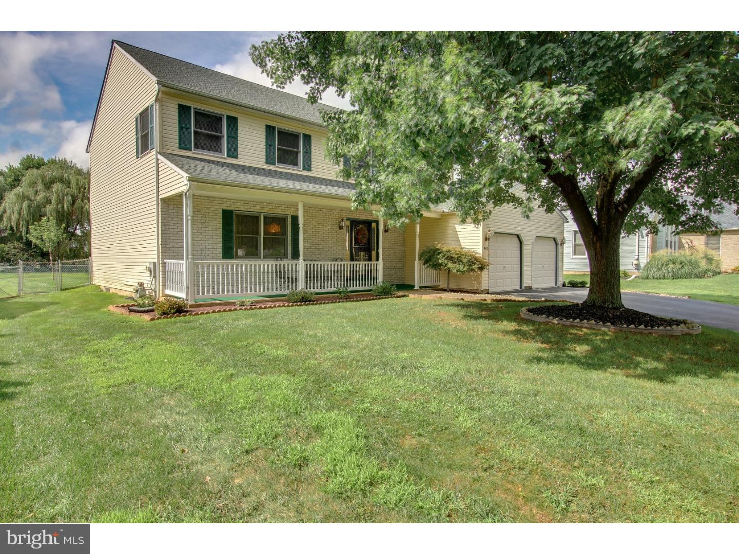 Beautiful partial brick front colonial in Hilltop Village.  Large covered porch and decorative front door with side light panels leads into the foyer, which flows into the formal living room with neutral walls and carpeting.  Formal Living Room leads into Formal Dining Room and continues the neutral decor.Kitchen has stainless steel dishwasher and gas range/oven.Spacious eating area off kitchen has sliding glass door which leads to large Stained pressure Treated Deck.Half wall from eating area opens into Family room  with masonry brick fireplace.Second floor features large  Master Bedroom which is spacious and neutral with ceiling fan. Master Bath off Master bedroom with neutral tile.Three additional bedrooms, all with ceiling fans and 2nd floor laundry room and hall bath completes the second floor.  2 Car attached garage.  Full finished basement with extra foot of height in basement.  Beautiful, large fenced-in rear yard! Additional improvements include a GAF Timberline Roof installed 3/19/14.LENNOX Heater,AC& Hot Water Heater  installed 9/12/14. This is a clean, well-cared for home!