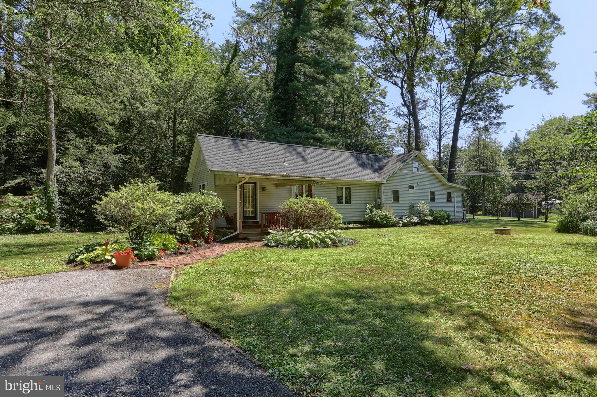 Charm and character exude in this secluded ranch style home in Ritzi Village off of Fishing Creek. Home is set on a 3/4-acre wooded corner lot and has 2 beds, loft area that could be 3rd bedroom and 1 bath. Kitchen boasts gas stove and eat in kitchen area, stone fireplace makes the living room cozy and comfortable, vaulted cathedral ceilings with skylight, formal dining room, library or sitting room, patio with hot tub, oversized 1 car garage and teeming with wildlife. Offers are coming in so we have set an offer deadline of Monday, August 4th at 12:00 (noon).