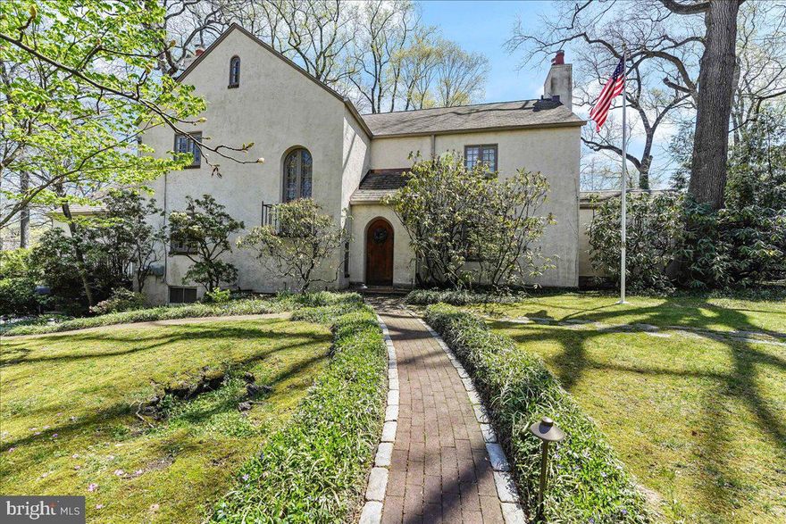 It’s truly something special when the dignity and grace of a 90+ year old home has been respected and tastefully updated and filled with love as owners and the world around us changes. Ballrooms and
conservatories of the past evolve into family rooms and offices and primary bedrooms. Homes and people adapt and space transforms and allow us to offer to the market the exquisite 244 Ogden Avenue.  Pass through the front vestibule into a proper foyer with a chessboard floor and access to all points in the home. To the right, a library with built-in bookcases, a fireplace with wood mantle emblazoned with the words, “East, West, Home is Best” provides a comfortable, if formal, entertaining space.  Beyond the library, awaits “The Snug” - truly the heart of this home. Once a ballroom and acoustically designed music space, The Snug offers a proportioned space for a sitting area surrounding a gas fireplace and built-in media station at one end, and a bar & billiards salon at the other end.  There are gentlemen’s and ladies’ half bathrooms and coat closets for visitors as well.  Beyond the main foyer to the rear of the home is a sun room with access through lead glass doors to the terraced back yard with a patio dining area, hot tub and outdoor stone fireplace. From the sun room, enter the updated kitchen with stainless steel appliances, a newer soapstone center island with built-in microwave, and a soapstone backsplash. There is a large pantry around the corner (which includes plumbing for alternate laundry) as well as a home office with built-in desk, and powder room. The kitchen connects to a formal dining room with hard wood floors, built-in storage, elegant trim with windows overlooking the back yard. Back to the main foyer you can ascend the center staircase to the upper floors, but be sure to check out the Harry Potter closet tucked under the stairs before you do so. The second floor features a primary bedroom suite with large walk-in closet and updated primary bathroom with double vanity, large glass-enclosed shower and separate toilet room. There are three additional bedrooms on the second floor including two that share an updated Jack-and-Jill bathroom. The third floor of their house had been transformed into the perfect gamer hang-out suite - boasting a large bedroom, with attached lounge for gaming, puzzling, and maybe even homework, as well as another updated full bathroom.  The semi-finished basement provides additional space for storage, an exercise space and a full laundry room. The home is situated in the award-winning Wallingford-Swarthmore School District, and less than 3/4 of a mile to the Borough of Swarthmore where you’ll find The Coop, Hobbs, Broad Table Tavern, Ship Bottom Brewery as well as the Swarthmore Regional Rail SEPTA Station. Swarthmore is less than 15 minutes to Philadelphia International Airport and just 20 minutes to either Wilmington, DE, or Center City Philadelphia or  90 minutes to either New York City or Baltimore.