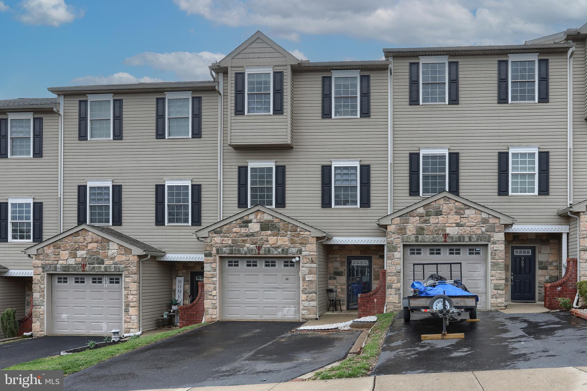 Welcome home to The Woodlands, a conveniently located neighborhood in Swatara Township, just 10 min to Harrisburg and 10 min to Hershey and Medical Center ! This 1936ft. Square Foot Home has just been Freshly Painted Top to Bottom and Features a first floor living room that walks out to the fenced in extended hardscaped patio, a perfect place to read a book this summer or set up your home office. Safe Play Space for Kids and Pets. Head upstairs to the main floor with large eat in Kitchen with Island and Granite Countertops. Kitchen is open to the formal living room and a half bath. You can access the second floor deck from the eat-in kitchen. All three bedrooms are located on the third floor. Primary bedroom has his and hers closets and the primary bathroom has a jetted tub. Additional 2 Bedrooms and Full bath complete upper floor. Freshly Resealed Driveway, New Roof , New Washer and Dryer complete this Easy Living Turn Key property This home is in a great location, Has LOW HOA Fees, and has been lovingly maintained, schedule your private tour today!
