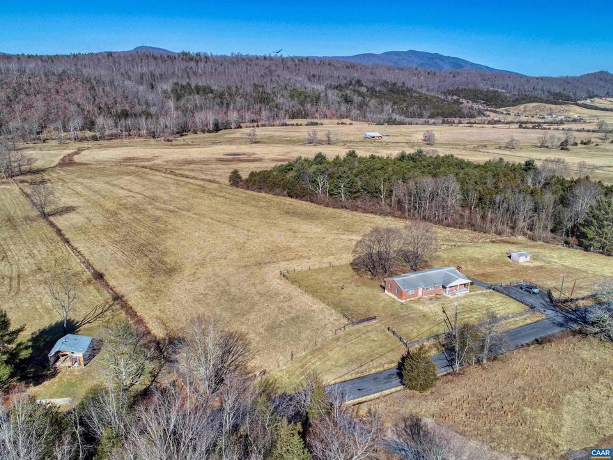 Located just 10 minutes from Craigsville, this private yet conveniently located 3 bed, 2 bath home sits on over 9 flat acres of land with gorgeous mountain views. Well built brick ranch style home offers single story living. Large basement with laundry units in place ready to be finished off. Storage shed in place.,Fireplace in Living Room