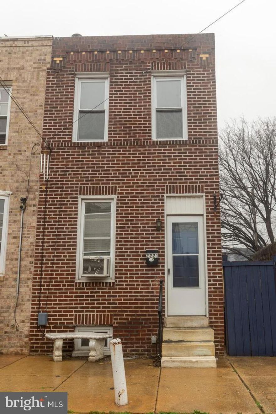 Great Starter Home or Investment! Presenting 2221 E Albert St, a delightful 2 bedroom, 1 bathroom single family rowhome! The entrance leads to a spacious living area with wood floors, a ceiling fan, and a window at the front. The dining area 
houses an in-unit washer/dryer combo and practical cabinet space, with access to your private back patio. This outdoor space is fully fenced and large enough for entertaining in the summer. The updated kitchen boasts a tiled floor and an efficient L-shaped workspace equipped with stainless steel appliances, including a gas stove, dishwasher, and fridge. Upstairs, the expansive bathroom offers a shower/tub combo. The middle bedroom is equipped with a modest closet and window, while the primary bedroom at the front includes a closet in the hall, a wardrobe, and 2 windows for natural sunlight. The unfinished basement provides valuable additional storage and the home comes with 2 window A/C units. Curb-cut for onsite parking exists. 
Current Owner was receiving $1500/month rent.
Call listing agent (Joan Rothmund) for showing access.