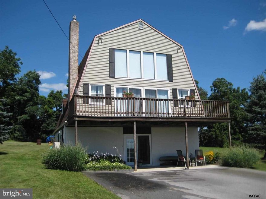 An awesome opportunity to this unique A-Frame in Lake Meade w/ view of the lake.  4 bedrooms and 2 full baths offers loads of living space.  Updated home w/ neutral interior and all appliances makes this one a real winner. Owners have added new flooring, new appliances, fresh paint and so much more. You will fall in love with this great home.  Enjoy the view of Lake Meade from your living room , bedroom , or deck.  Take advantage of all the amenities that Lake Meade has to offer.