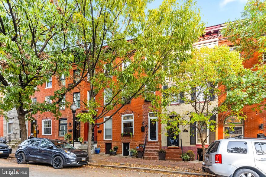 Price Repositioned!
 113 S Chester Street. This beautiful 3 Bed/2 and 1/2 bath in the heart of the city is bursting with old-world charm. Original wood floors in living room and dining room, exposed brick accents throughout, stone wood burning fireplace and eat kitchen space. Walk-in closets provide plenty of storage space! Private rear courtyard area and rooftop deck with panoramic city views.  Owned solar panels reduce energy bills! Blocks from Patterson Park & Hopkins!!