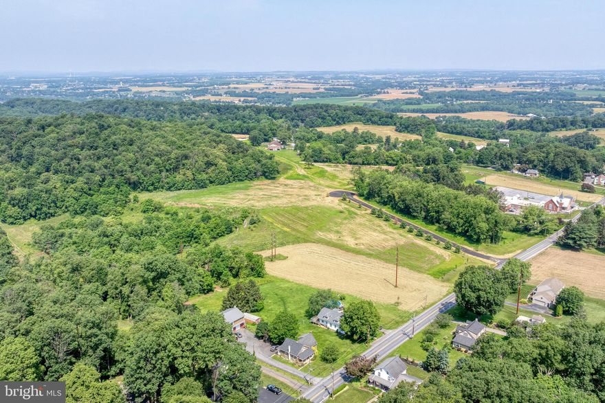 BUILD YOUR DREAM HOME HERE

This lot offers 9.9 Acres which is partly level. 
With Rural Residential zoning, you have many options for this great space including a home for you and your horses or space for a 2nd garage or pole building for the collector. 

There are 4 finished lots on this private lane and water management areas are already installed. A well is required. There is public sewer, Comcast internet and electric already available in the street.  See parcel drawing in online documents.

Developer to approve plans. No mobile homes permitted.