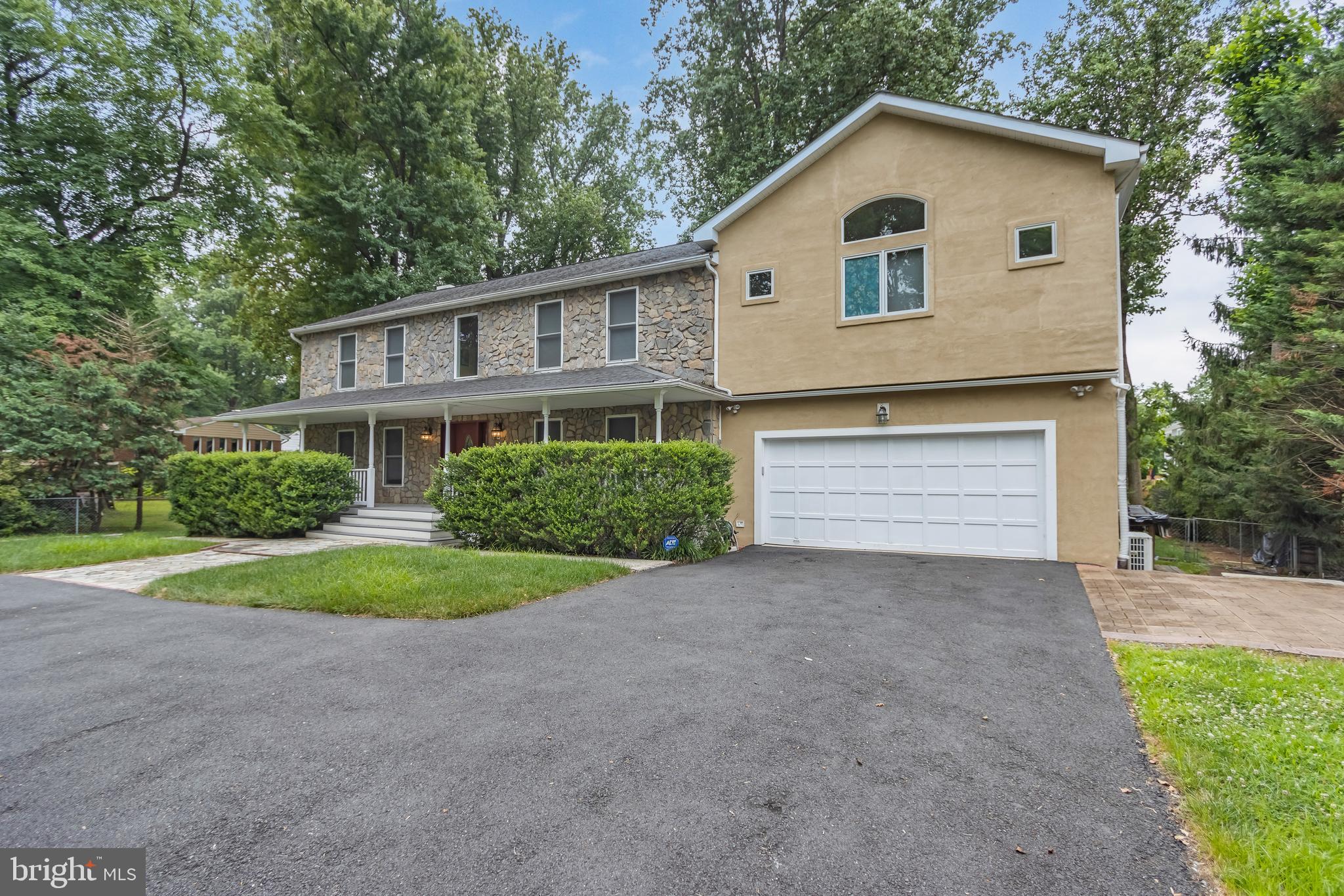 Furnished. 2 separate units. UPPER & MAIN levels for $5,000 (Washer & Dryer on main level) OR Walk-up fully-finished BASEMENT for $1,450 (refrigerator, electric stove, dishwasher, washer & dryer on basement level) OR $6,450 for ENTIRE HOUSE. HVAC and A/C replaced in 2024. Master bedroom with 2 master suites. Pets Case-by-case. Smoking Not Allowed. Multiple walk-in closets. Remodeled in 2010. Newly built home addition with top of the art bath. 2 whirlpool tubs (1 air tub, 1 water jets), 2 car garage + 4 cars to park in driveway. Large back yard (with bouncer). Hardwood floors on upper floors, tile and hardwood on 1st level. Newer appliances. Induction range, 2 double door refrigerators. Large private backyard with bouncer and deck. Across the road from Westwood country club, top schools, 4 min from Tysons Corner Mall and Greensboro metro station. Lease Term 9 months to 24 months. Online application via RentSpree (application fee = $39.99 per person over 18 years old).