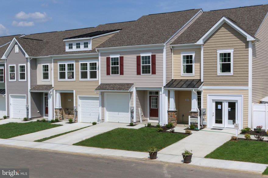 Ready for Fall Move-In. Welcome home to the Litchfield II Plan Townhome. The Litchfield II 3B, 2.5BA. features 2x6 construction, one car garage! Beautiful upgrades such as upgraded kitchen cabinets, Quartz countertops, hardwood flooring first , boxed oak stairs, alternate floorplan, full unfinished walkout basement, and so much more!!! McCauley Crossing features a quaint S. Berkeley location. Minutes to I-81,11 miles from downtown Winchester,12 miles to Hollywood Casino & 24 miles to Loudoun County. Call today to schedule your sneak peak today!