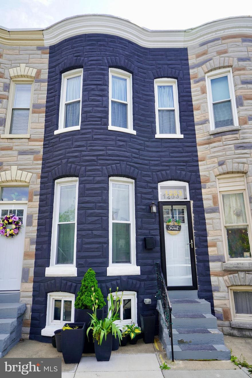 Welcome home to this charming 3-bedroom, 1.5-bath row home in the heart of Pigtown! Recently updated with all-new systems and appliances, this home is ready for your personal touch. The main level features an open floor plan with a spacious living room and a gourmet kitchen, complete with stunning granite countertops. A half bath is conveniently located on this level, along with access to the back parking pad.

Upstairs, the master bedroom offers a lovely street view of the front of the house, providing a bright and peaceful retreat. Two additional rooms are versatile and can be transformed into a bedroom or home office to suit your needs. The full bathroom on this level adds extra convenience.

The unfinished basement offers excellent storage space and houses brand-new laundry appliances. Plus, a brand-new water heater ensures worry-free living for years to come.

Located just minutes from Ravens Stadium, Orioles Stadium, the Baltimore Harbor, Federal Hill, and Fells Point, offering endless options for entertainment, dining, nightlife and more. If you love to travel, you're only 15 minutes from BWI Airport, making this home ideal for those on the go. This location truly offers the perfect balance of comfort, convenience, and city living. Come see it today!