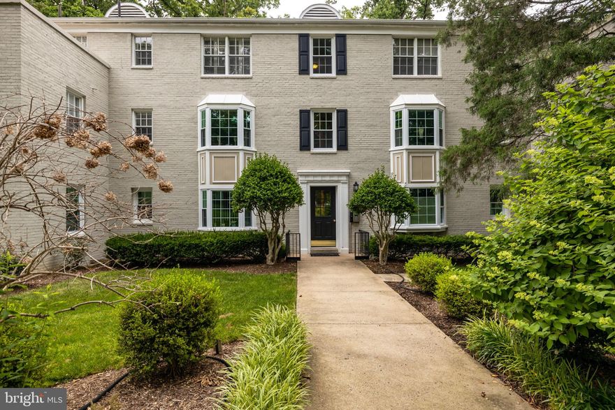 Welcome to 700 S Arlington Mill Drive #103, a beautifully remodeled 2-bedroom condo in Arlington’s sought-after Park Glen! This stunning unit features stylish light fixtures, brushed nickel hardware, and gleaming hardwood floors that extend throughout the main living area and both bedrooms. The bright living room is enhanced by recessed lighting and a bay window that fills the space with natural light. Just off the kitchen, the separate dining area features a chic light fixture—perfect for meals or entertaining. The fabulous kitchen is equipped with a built-in wine cooler, striking quartz countertops with a waterfall edge, stainless appliances, a sleek tile backsplash, and pendant lighting over a counter overhang—ideal for seating. The tastefully renovated bathroom boasts wide-plank tiles, built-in shelving for towels and accessories, and a modern vanity with a contemporary light fixture. Both generously sized bedrooms offer ample closet space and windows with views of the trees and courtyard. One of the rooms features a custom brick accent wall that adds vintage charm. Park Glen offers excellent amenities, including dedicated storage space for each unit, a community pool, well-maintained common grounds, and a laundry facility conveniently located downstairs. Ideally situated near the Arlington Mill Community Center, parks, the W&OD Trail, Shirlington, D.C., and major commuter routes, this exceptional condo offers comfort, style, and convenience—all in one. Heat Pump/Trane 2017 Water Heater- Condo common water heating system Windows 2022 All appliances 2022