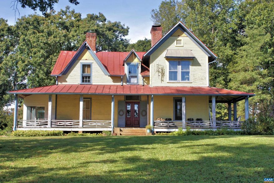 Arrowhead Farm in southern Albemarle county is centrally located in the midst of many historic estates.  Adjacent to Arrowhead are Old Woodville, Nydrie, Esmont House, Guthrie Hall, and Tallwood.  You have complete seclusion as you drive in from Forsyth Road.  The beauty of Arrowhead is evident as you approach with multiple gables, a deep wrap around porch and stunning red metal roofing.  Heavy chestnut timbers throughout have created a stable foundation.  Inside, each main level room is spacious, with 10 1/2 foot ceilings. There has been a master bed/bath added downstairs, and upstairs are 4 more bedrooms plus 2 full baths.  The home has a 2 separate heat pumps, drilled well, and brand NEW 5 bedroom conventional septic installation (2022).  Arrowhead Farm has approximately 1/3 of the acreage in open fields, the rest in mixed woodland. The property is under conservation easement, with one division potential.