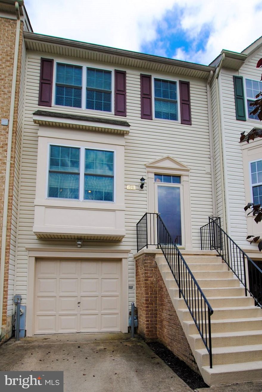 Call CSS 866-891-7469  Pristine garage townhome-Updated & better than new!  Kitchen wood cabts, SS appls., granite & island; paint & crown moldings, new w/w in bedrooms, & remodeled powder room. From the foyer, hdwds flow into the dining/living area. WB fp in liv. room w/access to deck.  LL fam. rm w sliders to patio. Roof, siding, windows, shutters, doors, HVAC system & H20 heater were replaced.