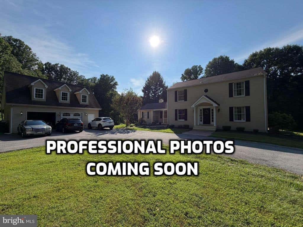 Photo of 11890 Triadelphia Road, ELLICOTT CITY, MD 21042 (MLS # MDHW2071472)