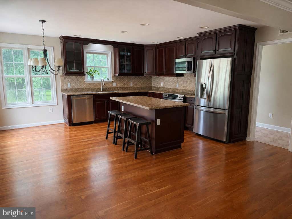 Photo of 11890 Triadelphia Road, ELLICOTT CITY, MD 21042 (MLS # MDHW2071472)