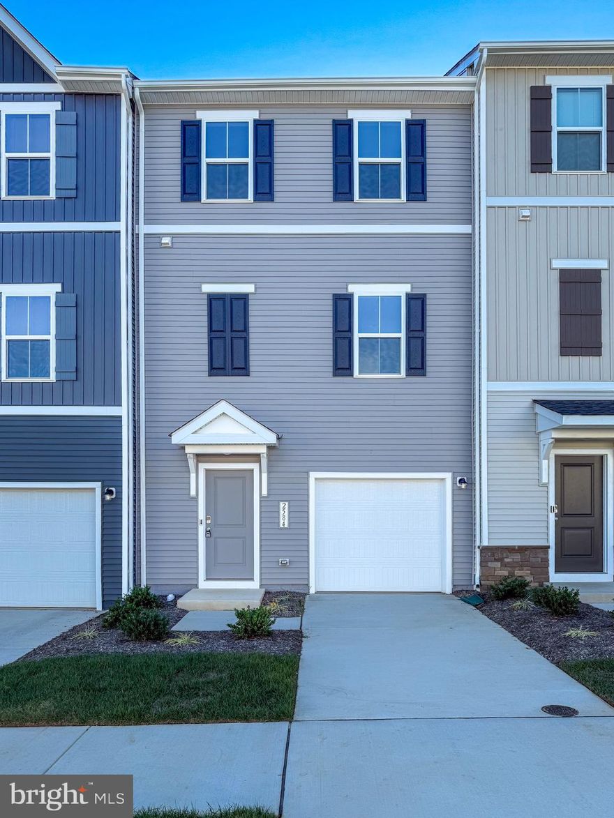 Welcome to 2584 Cougar Ln., a newly constructed & never lived in townhome by K. Hovnanian nestled in the highly sought-after Wilderness Shores community. This beautifully designed three-level home boasts three spacious bedrooms, three and a half bathrooms, a versatile lower-level recreation room or fourth bedroom with a full bath, and a one-car garage with an additional driveway and community parking. The open-concept main level features a bright and inviting layout, featuring a gourmet kitchen with stainless steel appliances, quartz countertops, upgraded cabinetry, a pantry, and a large island that seamlessly flows into the dining area and great room with a deck for entertaining. Upstairs, the primary suite offers a relaxing retreat with a spa-inspired bath, quartz countertops, upgraded tile, and a generous walk-in closet. Two additional bedrooms and a convenient laundry area on the bedroom level.. Step outside to enjoy a the overlook of a serene pond, perfect for entertaining or unwinding. As a resident of Wilderness Shores, you’ll have access to exceptional amenities such as a clubhouse, outdoor swimming pool, playgrounds, and scenic walking and biking trails. Strategically located between Fredericksburg and Culpeper, this home offers the ideal blend of tranquility and convenience, providing easy access to shopping like Walmart and more, dining, recreation, and major commuter routes. Don’t miss out on the opportunity to make this stunning new townhome your own.