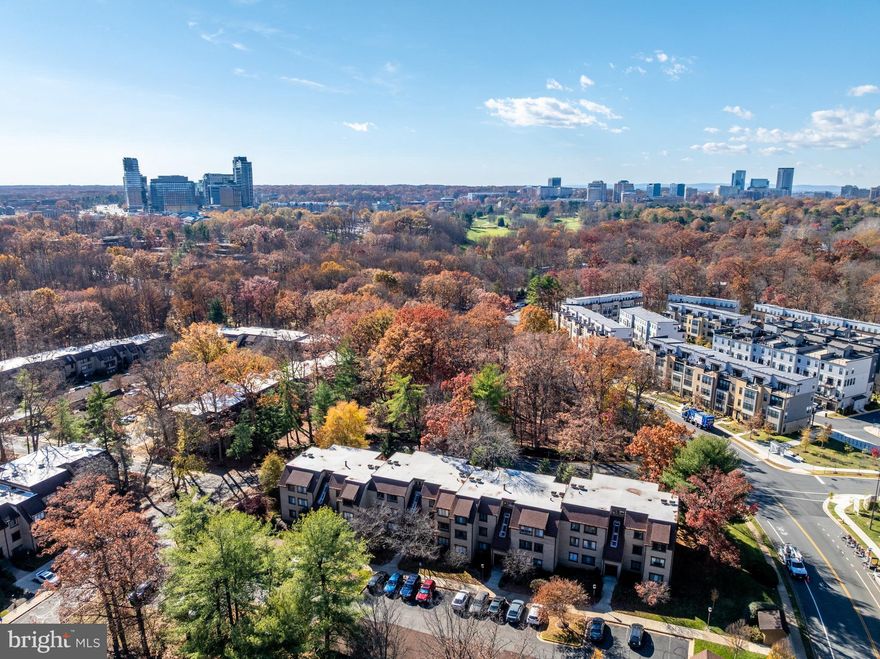 Welcome to this bright and inviting top floor 2-bedroom, 1-bath in sought-after Bentana Park.
Ideally located near the heart of Reston, this home is just a short walk to shops, trails, Lake Anne, and Lake Fairfax—and only a 5-minute drive/10 minute walk to the Wiehle Metro Station.

Inside, you’ll find an open, modern design with a wall of windows and sliding glass doors leading to a private balcony overlooking peaceful wooded views. The spacious living room with 10’ ceilings (only on the top floor!)  flows seamlessly into the dedicated dining area and thoughtfully designed kitchen. Freshly painted and featuring stainless steel appliances, the kitchen offers everything you need—plus an incredible view.

A full-size washer and dryer (new as of 2024 & 2025) make everyday living easy, while both bedrooms provide generous storage and shelving. The primary bedroom also includes new double barn doors for a stylish touch.

To top it all off, all utilities are included in the Bentana Park condo fee—and a sought-after covered carport conveys with the unit. New HVAC as of 2023.
