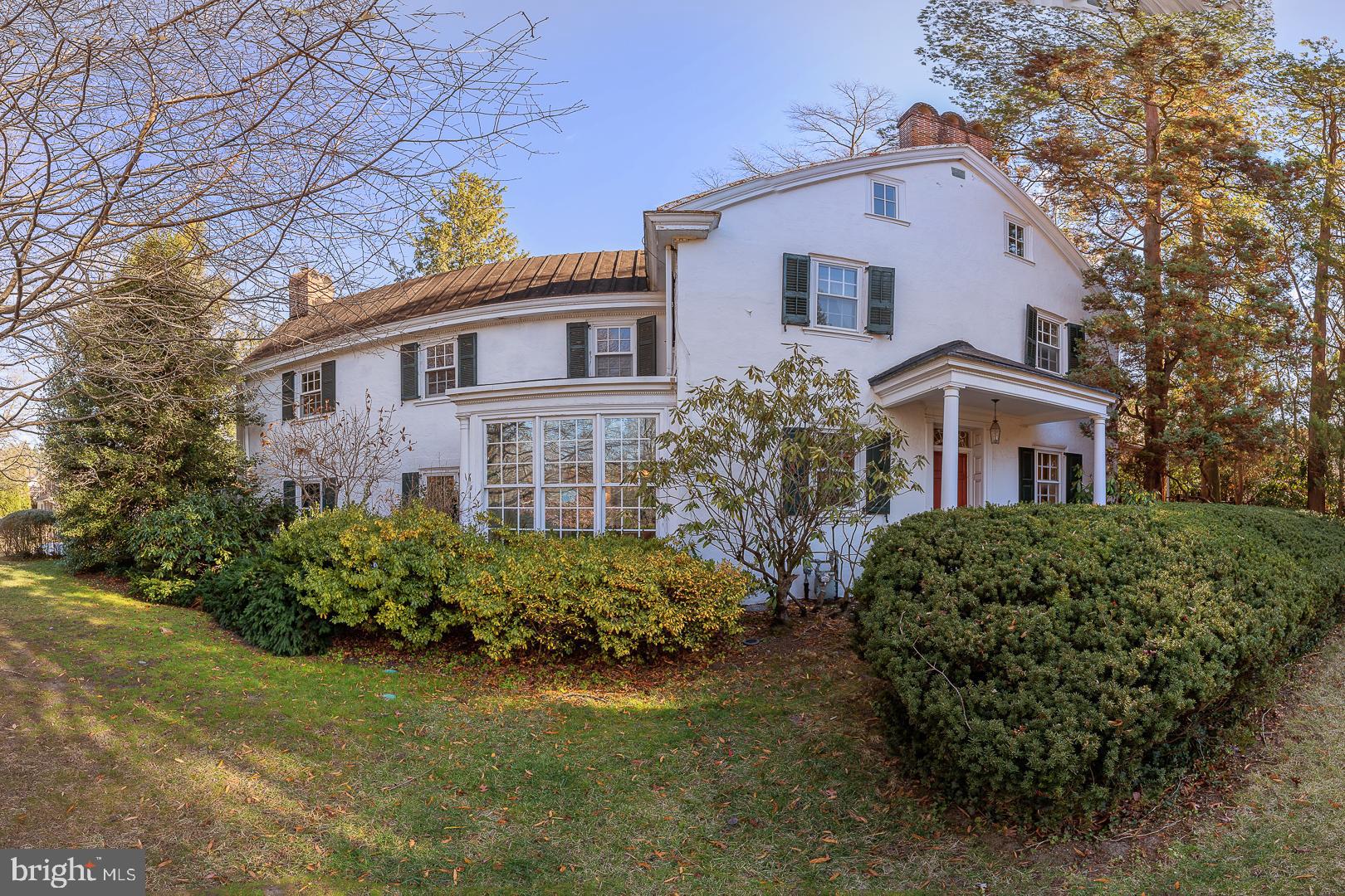 Step into timeless elegance with this one-of-a-kind home and experience what it is like living in a piece of colonial history. The core of the house was originally built in 1740 and then there was an expansion in the 1790s and again in the 1920s. Hosting 6 spacious bedrooms and 3.5 luxurious baths, this residence exudes charm at every turn. The fully renovated swimming pool offers a private oasis, perfect for relaxation or entertaining.
The inviting kitchen features a delightful bay window, blending character with functionality. Cozy up by the fireplaces in the owner’s suite, living room, or the charming library, each space offering warmth and ambiance. The bathrooms have been meticulously updated with high-end spa finishes, delivering modern luxury while retaining the home’s historic allure.
Located in the award-winning Lower Merion School District, this home provides exceptional educational opportunities. Enjoy the convenience of easy access to public transportation, with a train station stop just across the street. Nature lovers will appreciate the proximity to a beautiful public park, perfect for outdoor activities.
Ample closet space ensures practicality, while the unique architectural details make this property truly special. This home is a harmonious blend of history, comfort, and sophistication—an absolute treasure for those seeking a residence with character, modern amenities, and an unbeatable location.
