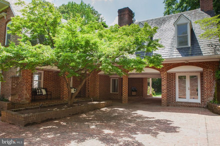 This 1935 converted Carriage House offers an amazing opportunity to live on the shore of the Potomac River.  Sitting on a secluded half-acre lot at the end of a private cul-de-sac, the property features mature trees and a gently sloping rear yard that leads down to 39 feet of river-frontage.  The house currently offers  3,645 square feet of finished living space with 4 bedrooms and 3.5 bathrooms.  A deck off the second floor living room and a brick patio off the lower-level family room provide fantastic outdoor seating areas to enjoy the expansive river views. 
The house is being sold strictly AS IS, but the HVAC, hot water heater, and dishwasher have all been replaced in recent years.  To help buyers visualize the possibilities, the current owners are offering Architectural Conceptual Plans to renovate the current home.  The plans provide three separate options for transforming this residence; blending contemporary style with the existing character of this classic red brick carriage home.  Imagine creating a home flooded with natural light with floor to ceiling windows across the entire back of the house and relaxing in the tranquil primary bedroom suite overlooking the water watching the boats sail by. Turn this truly unique property into the waterfront home of your dreams.  
This picturesque property can be your own private sanctuary just 5 miles to Old Town Alexandria, 10 miles to Reagan National Airport, Crystal City or Amazon's HQ2 location, and 12 miles to downtown Washington, D.C.