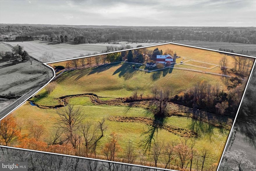 Nestled amidst over 57 acres of rolling countryside, Twin Chimneys is a rare gem—a premier equestrian and multi-use estate blending historical charm with modern luxury. This exceptional property boasts a circa-1762 Federal-style manor house, guest house, 2-story bank barn, expansive grounds, and an array of amenities that elevate rural living to a refined art form.  

At the heart of the estate stands the stately main residence, offering six bedrooms and three and a half baths. This property was originally a two story stone farmhouse, built in 1790. In the 1800’s the three story brick post federal house was built. The bricks for this project were kilned on the property, near a large sycamore tree beside the White Clay Creek that wanders through the property. The twin brick chimneys were a functional necessity when built, and still adorn the home today. 

Step inside modern day Twin Chimney, to the grand center hall, where timeless elegance greets you. The large open foyer is flanked by a formal dining room equipped with a built-in butlers pantry and a sizable living room with a detailed, wood-burning fireplace. The living room lends access through double doors to a cozy sitting room. Tucked lovingly away is the parlor with a timeless, staple wood burning fireplace and the original keeping room, a historic centerpiece, featuring an oversized hearth that once served as the home’s culinary hub, now a captivating nod to the past. 

The main level seamlessly combines old-world charm with thoughtful modern upgrades. The open-concept kitchen, renovated in 2008, is a chef’s dream with custom butternut cabinetry, an AGA oven, a Sub-Zero refrigerator, a built-in steamer, and an espresso machine, and now features a breakfast nook addition. The airy family room features a stunning cathedral ceiling, skylights, a floor-to-ceiling stone fireplace, and opens through French doors to a spectacular outdoor oasis.

The pool area is paved in Pennsylvania bluestone and features a hot tub and a gazebo, perfect for entertaining or serene relaxation. A nearby fire pit and second gazebo overlook the scenic vistas, offering an ideal setting for sunset gatherings.  

The second floor of the home boasts a luxurious primary bedroom wing. This includes a private sitting area, fireplace, access to a wet bar and intimate balcony with sweeping views. Additional bedrooms, including a converted office and laundry space, ensure ample flexibility for family and guests. The third floor features a custom dressing room and two additional bedrooms, while a walk-up attic on the fourth level provides generous storage.  

Just steps from the main house, a remarkable 5,000+ square-foot bank barn invites endless possibilities. With six oversized stalls and equipped with water and electricity, the barn is ideal for equestrian pursuits. Its loft, overlooking the picturesque landscape, is perfect for hosting grand events or celebrations.

Outbuildings include a charming three-bedroom guest house that offers comfortable accommodations for visitors or staff, while the surrounding grounds include many fenced pastures, run-in shed, a springhouse, gardens, and soft rolling landscape overlooking its own portion of White Clay Creek.

Conveniently located near shopping and amenities and offering easy access to Route 1, I-95, and major hubs like Wilmington, Philadelphia, and Baltimore, Twin Chimneys is as accessible as it is enchanting.  

This extraordinary estate is more than a home—it’s a legacy waiting to be passed down. Additional acreage is available for those seeking even greater opportunity. Schedule your private tour today to experience Twin Chimneys’ unmatched beauty and versatility.