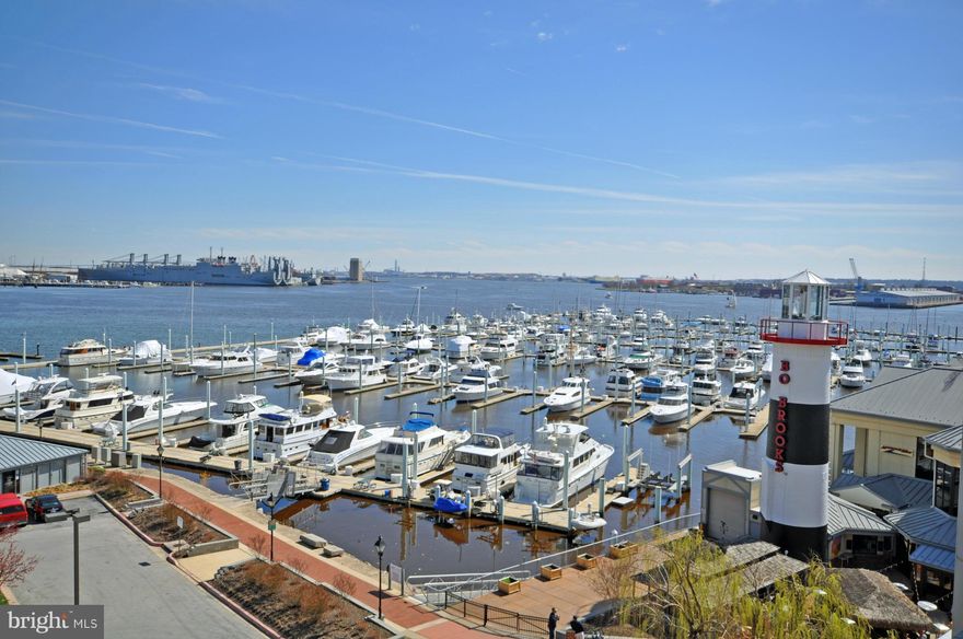 Be on vacation every day in this pristine waterfront condo! Smart layout includes LR/DR w/double sliders to 19-foot balcony, and an updated open KIT w/pantry, new granite counters & stylish linear floor tile. The BRs are at opposite ends of condo for privacy & each has its own updated BA. Enjoy the assurance of 24-hour security & garage parking. Steps from promenade, pool, gym, shopping & dining.