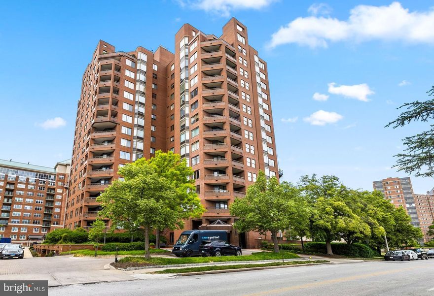Set within the distinguished Saint James Condominium, this rarely available 2200sq ft  2‑bed plus den and 2.5‑bath residence offers  generous room sizes, and natural light from its elevated 14th‑floor position. The expansive living and dining area provides an inviting backdrop for everyday living and entertaining, complemented by kitchen with ample storage and workspace. The primary bedroom wing  has 2 walk in closets, bath  with standing shower, Jacuzzi jetted tub, two sinks. A second bedroom is served by a full bath, offering flexibility for guests or a home office. A den/library with hard wood floors is enhanced by two walls of built‑ins and a dedicated sink—Additional highlights include in‑unit laundry, a convenient half bath, and two assigned  covered parking spaces. Valet /doorman 8-12 , receptionist 24 hrs, 3 porters M-F, outdoor pool, 24 hr gym, library., and a storage unit. Water is included in condo fees. Residents enjoy secure entry, professional management, and an unbeatable location near Johns Hopkins University, Baltimore Museum of Art and all the amenities of Charles Village and Tuscany‑Canterbury.