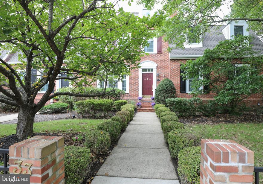 This absolutely gorgeous brick townhome in the highly desirable Heritage Hills boasts the combination of quality, charm and location.  This is one of the best floor plans the community has to offer. The large, updated kitchen offers granite countertops, brand new stainless steel appliances, porcelain tile flooring, recessed lighting and plantation shutters. The living room and dining room are open concept and features include a brick fireplace, crown molding, and large picture windows overlooking the beautifully landscaped backyard and patio. Hardwood flooring throughout the home.  The 2nd floor primary bedroom offers vaulted ceiling, skylights and a remodeled primary bathroom. The 2nd bedroom on this level is spacious with it's own private bath. The 3rd level is home to a large bedroom suite with private bath. The lower level of this home features a bright, spacious family room with fireplace and glass sliders leading to the beautiful bluestone patio nestled between brick walls giving a courtyard effect. Other features include: 2 zone HVAC, plenty of storage in the pull down attic above garage as well as a semi finished basement work room.  Bookshelves in basement turn into a Murphy Bed. Close to I-95 as well as NYC and Philadelphia.