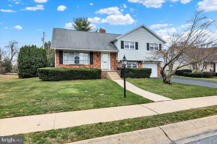 12 Kevin Court - This well-maintained, move-in ready, split-level home is located in the East Whitfield neighborhood within the Wilson School District. Offering four bedrooms and two and a half bathrooms, the property includes a one-car garage and sits on a level 0.20 acre lot with a private backyard setting.
The main level features a living room and dining room with hardwood flooring, along with a functional kitchen. A short flight of stairs leads to three secondary bedrooms and a full hall bathroom. The upper level includes the primary bedroom with its own private bathroom. A large floored attic provides ample additional storage. The lower level offers a spacious and inviting family room with a brick fireplace and direct access to the backyard patio, screened gazebo, and level yard, ideal for relaxing or entertaining. This level also includes a powder room and access to the one-car garage. A clean, generously sized basement houses the home’s mechanical systems (gas furnace '24, gas hot water heater '22, water softener '23) and laundry area; the washer and dryer are included with the sale. Situated on a quiet cul-de-sac street, the home is conveniently located just minutes from schools, parks, shopping, dining, and major commuter routes. Open Houses are scheduled for March 14 from 1:00–3:00 PM and March 15 from 12:00–2:00 PM.