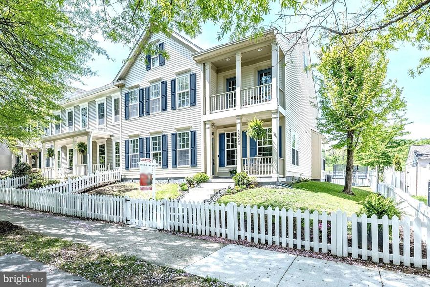 Beautiful colonial style end unit townhome that looks and feels like a single-family home in charming Belmont Greene. This home’s large premium corner lot features a fully fenced yard with Trex decking, an electric awning and  stone paver patio, perfect for enjoying sunsets and s'mores under the stars. ****** A dramatic two-story foyer with a beautiful, beaded chandelier welcomes you home as hardwood flooring flows into the formal living room with soft neutral paint and crown molding. Opposite the foyer, the elegant dining room echoes these details and is accented by chair rail and another chic beaded chandelier adding refined style. Natural light fills the open concept gourmet kitchen and inviting family room. An oversized island with bar seating, stainless steel appliances, and abundant cabinetry with brand new herringbone backsplash provides a beautiful space for cooking and entertaining. The family room features a cozy gas fireplace surrounded by built-ins for decor and storage. A lovely powder room compliments the main level. ****** Upstairs, a dual entry door opens to the luxurious primary suite boasting a romantic gas fireplace surrounded by built ins, an expansive wall closet and walk-in closet, and a spa like bath with walk-in shower and soaking tub. Two additional spacious bedrooms share access to the hall bath, while a laundry closet with full sized washer and dryer on this level adds convenience. The uppermost level features a huge and versatile 4th bedroom with skylights, office space, a full bath, walk-in closet and storage space. An attached rear loading two car garage provides plenty of room for all your outdoor activities. Recent updates include:  Hot Water Heater (2019), Roof (2021), Washer and Dryer (2023), and Dishwasher (2023). ****** Belmont Greene welcomes you with tree lined streets, community ambiance, white picket fences and numerous open spaces throughout the community. Enjoy summers at the pool with beach entry, fountain and kiddie pool, community center, sand volleyball, tennis, and pickleball courts, tot lot, and playground. Walkable to the W&OD Trail which offers miles of scenic biking, running, and walking paths as well as Trailside Park and Playground. ****** Ideally located minutes from Historic Downtown Leesburg, One Loudoun shopping and dining, Silver Line Metro, Dulles International Airport, Inova Loudoun Hospital, and major commuter routes including Routes 7, 28, the Greenway and Dulles Toll Road. Convenient shopping Wegmans, Trader Joe’s, Costco and many other retail stores are a quick drive away. With thoughtful updates, an unbeatable location, and vibrant community amenities, 20333 Charter Oak Drive isn’t just a home—it’s your next chapter. Welcome Home!
