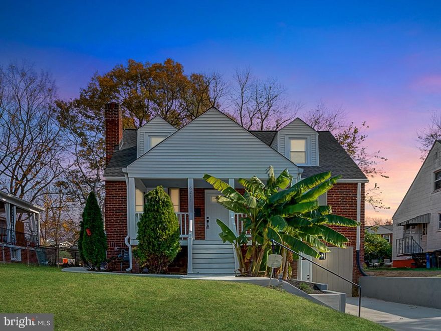 Welcome to this beautifully renovated home in the heart of Hyattsville! Featuring refinished hardwood floors, stylish bathrooms with a custom wood accent wall, and a modern kitchen with updated tile work, this property blends timeless charm with contemporary upgrades. Enjoy the inviting new front porch, cozy fireplace, and finished basement offering flexible space with 2 bedrooms (NTC). Conveniently located near schools, parks, and commuter routes. A must-see for buyers seeking comfort, charm, style, and location! **WASHER AND DRYER IN UNIT*