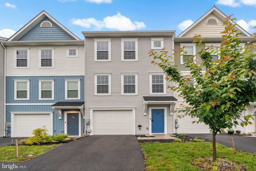 Newer townhome for rent in Martinsburg! Just built in 2021, this home is freshly painted, move-in ready, and offers close proximity to local schools, shops, and restaurants. Walk in on the basement level that features a rec room. The main level offers an open concept with a spacious living room, half bath, and access to the oversized deck where you can grill and chill. Upstairs you will find 3 bedrooms and 2 full baths, including the primary suite with walk-in closet and double vanity. **NO SMOKING. Tenants to obtain renter's insurance. Tenants pay all utilities. Pets allowed on a case by case basis as approved by the owner. Contact listing agent for link to online rental application.