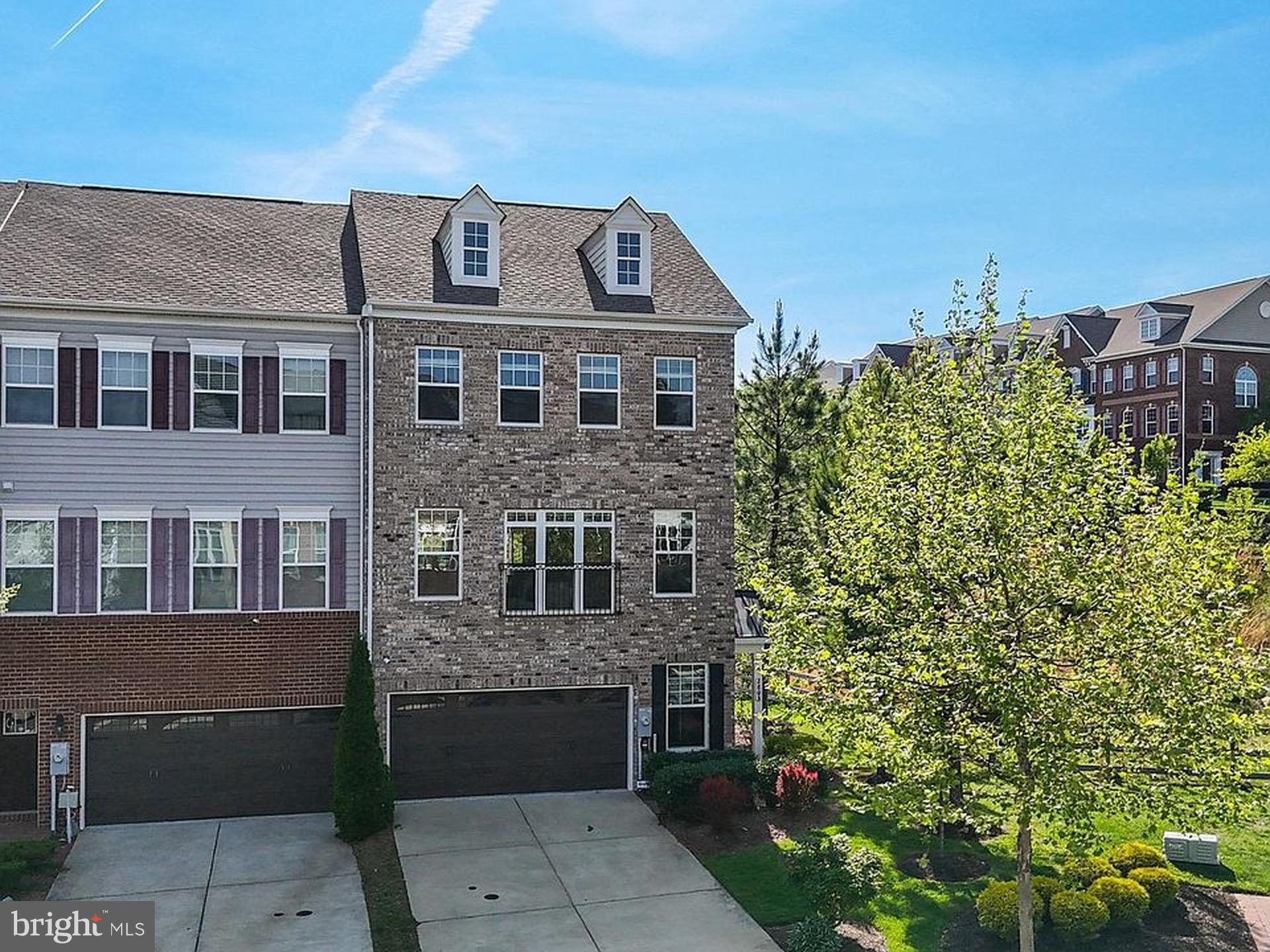 Stunning luxury end-unit townhome in Upper Marlboro’s premier golf course community—BeechTree East Village. Perfectly blending sophistication, comfort, and convenience, this 3-bedroom, 3.5-bath home spans over 2,470 sq ft and is packed with high-end finishes for the discerning buyer. The gourmet kitchen features granite countertops, stainless steel appliances, double ovens, and a custom pantry built for lasting function. Rich hardwood floors, smart home tech, and an open-concept layout create a seamless flow into your private fenced backyard—an outdoor oasis ideal for entertaining or quiet evenings. Upstairs, the spacious owner’s suite is a retreat with soaring ceilings, a spa-inspired bath with dual shower heads, and custom walk-in closets. The fully finished basement offers flexible space for a home office, gym, or theater room. The oversized two-car garage is climate-controlled for year-round comfort, paired with a large driveway for added convenience. Energy-efficient upgrades include sub-metering, a newer water heater, and a full irrigation system. Located within walking distance of the championship golf course and just steps from walking trails and dog parks, BeechTree offers world-class amenities: two pools, tennis courts, a fitness center, and a country club—all minutes from D.C., commuter routes, and shopping. This is luxury living redefined.