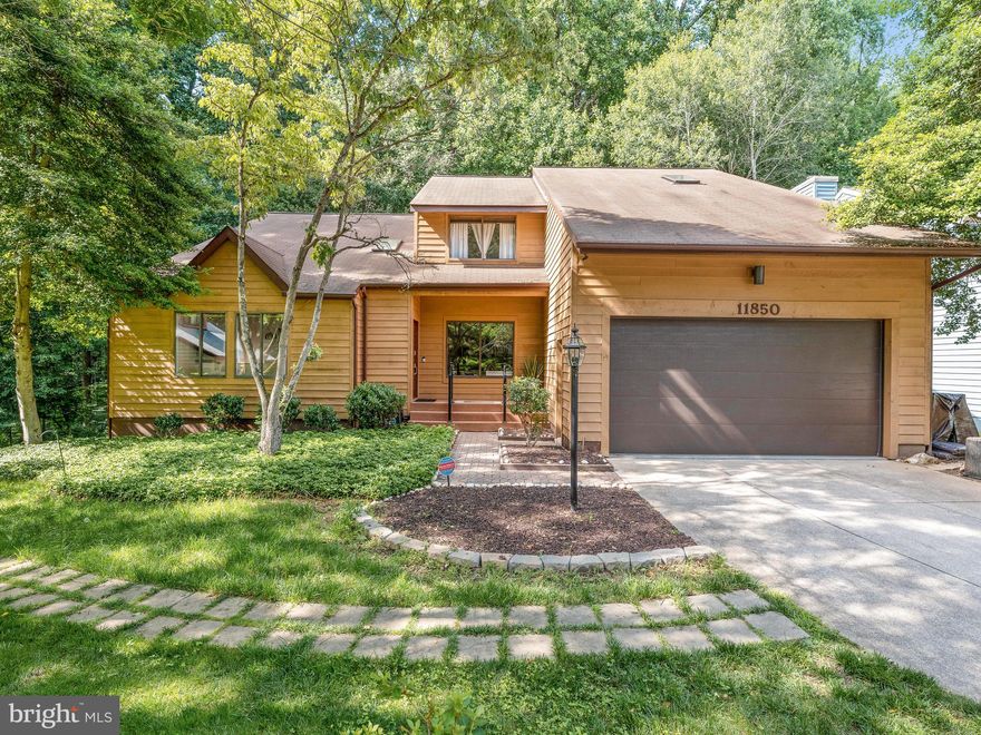 Incredible find! Rare and unique contemporary colonial on premium cul-de-sac lot backing to lush wooded preserve! If you want peace and serenity on your multi-level deck or screened porch, this is the one! Nestled against hundreds of acres of forest, streams, middle patuxent river, trails and much more!  Great layout and design including a gorgeous open foyer & living room with vaulted ceilings, updated kitchen with newer black stainless steel appliances,  terrific rental or in-law possibilities withe the fully finished walkout basement with 2nd kitchen, huge master bedroom suite & much more!  Scenic views from most every window! All this plus a main level den/guest room, 4 full baths, hardwood flooring, designer kitchen ceramic tile, and many other trendy touches make this home a must see!  Don't miss the video and interactive floor plan tours being uploaded 6/14!  CPRA approx $120/month paid annually includes an abundance of recreation facilities, etc.