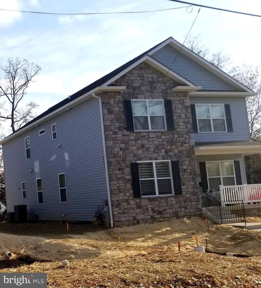 ***Best priced new home in the area!***Great opportunity to purchase a home in one of Baltimore's nicest areas. This home features a spacious airy floor plan with 9' ceilings on the first floor, 2 zone heating and air conditioning, wood floors. Huge gourmet kitchen with dual stainless appliances, island and granite counters.  Picture is from a similar home built by same builder which can be viewed. Lower level has been framed to accommodate 2 additional bedrooms, full bathroom and large rec room.