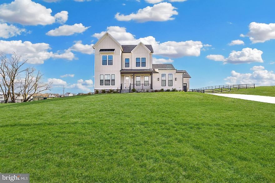 Welcome home to this stunning single 5 bedroom 4.5 bathroom family home situated on over 3 acres within Waterford's exclusive Glenmore Farm community!  Newly built in 2024, this Oatland III model features many builder upgrades!  The main level features wide-plank engineered hardwood flooring, a dedicated office/study, primary bedroom with double walk-in closets, huge primary bath with dual sinks, glass shower with seat and custom tile work, secondary bedroom with full bath, soaring ceilings in the main living area, fireplace with custom stone work extending up to the ceiling and windows everywhere!  Enjoy entertaining guests in the luxurious kitchen with massive quartz countertop with seating and cabinets on both sides, stainless steel farmhouse kitchen sink, double ovens, quartz countertops throughout, subway tile backsplash, stainless steel appliances, 5 burner gas cooktop, walk in pantry, dedicated dining area with extended cabinetry and countertops for hosting large parties!  Enjoy cool spring and summer nights on the screened in deck with recess lighting and plenty of room for grilling! The upper level features a large flex space with continued wide-plank hardwood floors, and two more bedrooms and full bath.  Head downstairs to the massive finished basement with entertainment areas everywhere.  Full bar with seating space, quartz countertops, tons of cabinets, wine and beer fridge and sink!  The lower level also features a huge 5th bedroom with a walk-in closet and full bathroom, storage area with space for a gym, and roughed in additional plumbing.  This amazing home is also wired with whole home Sonos sound system, large flat rear yard, 3 car garage, and playground area.  This exceptional property is move-in ready and offers elegance with convenience surrounded by beautiful views of the Blue Ridge mountains.  Schedule your showing before it's too late!