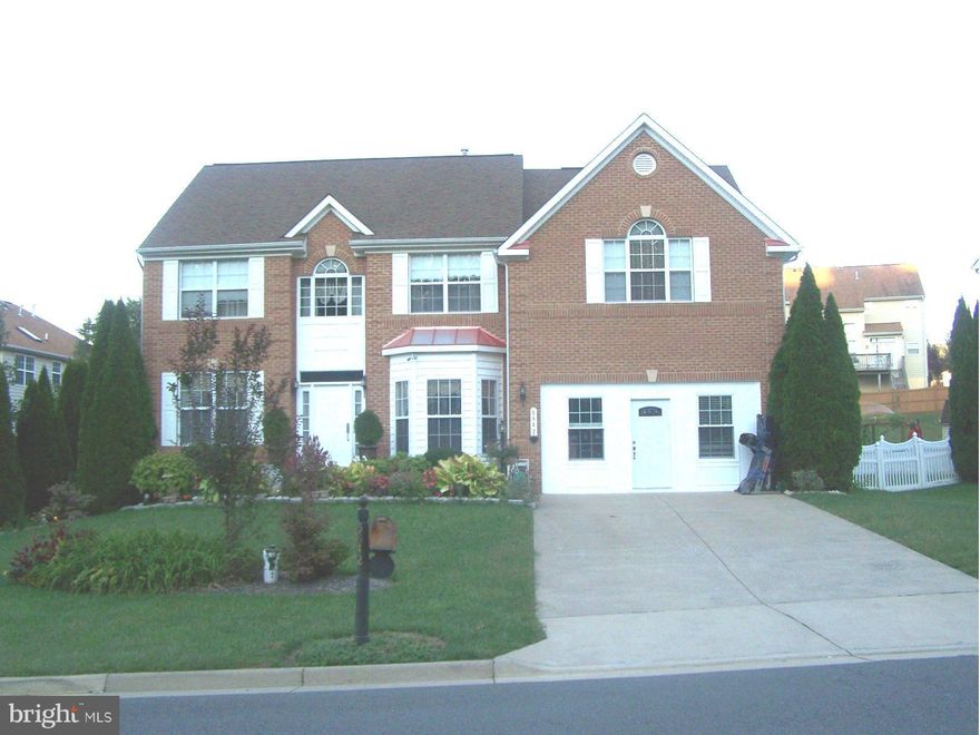 PERFECT FOR EXTENDED FAMILY...Open living and dining rms,  study, gourmet kitchen w/ granite, stainless steel appliances ,backsplash, downdraft. family rm, sunroom.  Lower level  recreation rm, mini kitchen. 5th bedrm (ntc), full bath, and den. Garage finished w half bath, efficiency kitchen.  Deck, fenced yard, shed.Mins to I-95, bus, comm lots, VRE,  Quantico/Belvoir., NO HOA, pets case by case.