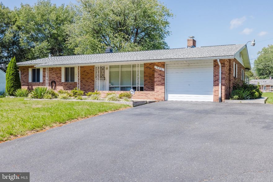 Quaint Brick Rancher on .43 Acres.  3 BR 2 full baths with 1 car garage and ample driveway parking.  Be welcomed into the spacious living room with abundant natural light and hardwood floors.  Living room opens to family room for all your entertaining needs.  The kitchen boasts a peninsula with breakfast nook. Primary bedroom with ensuite bathroom and 2 additional spacious bedrooms all on one level for ease of living.  The lower level is open with plenty of storage.  Level backyard for all your fun and enjoyment.
