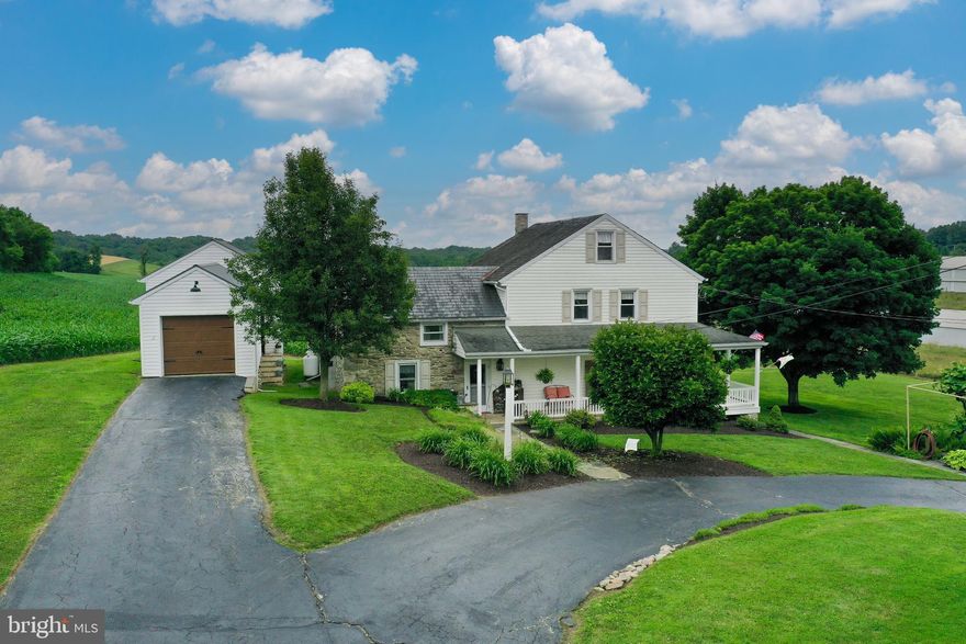 Sitting on over 58 acres of land and located just south of Lancaster City, this sprawling farm offers endless opportunities as an income producing agricultural property or would be perfect for someone looking for a large estate. Featuring a spacious 4 bedroom, 2 bath farmhouse built around the original log home that sat on the property, there is so much original woodwork and character throughout while also featuring modern amenities such as central air, replacement windows, and a large family room addition with vaulted ceilings, skylights, and large glass patio doors that lead to a spacious patio. This is the perfect setting for entertaining or enjoying quiet evenings while taking in your gorgeous panoramic farmland views. The property features a beautiful bank barn that has been restored and provides 3 drives and 2 bays on the upper level while providing tons of storage in the lower level. Current owners have hosted numerous weddings and family get-togethers in this space and it could possibly be built out to explore more opportunities as a hosting venue and event space. There is a single garage and summer kitchen on the property that could be built out as an additional in-law quarter or possibly a residential rental option as well. Featuring a 44'x360' 2 story poultry house, the seller is currently contracted with a poultry management company and this facility provides significant income possibilities. Additionally, there is a 4'0x40' heated garage, a 32'x74' heated wood shop, and two other storage buildings, one of which was previously used as a farrowing house. Currently, 50 acres of the property are tillable and are being farmed while an additional 3 acres are planted as pasture. This parcel is registered with Clean and Green for tax savings but is not registered under any Agricultural Preservation programs.