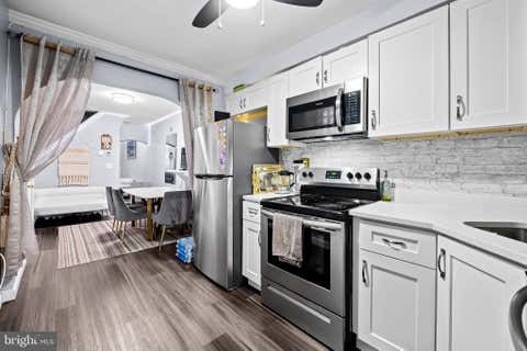 Photo of 236 S Gilmor Street, BALTIMORE, MD 21223 (MLS # MDBA2224192)