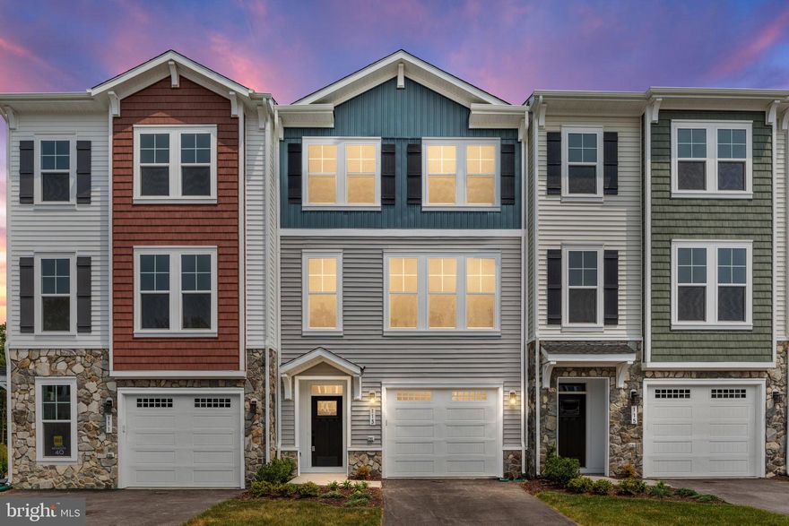 BEAUTIFUL TOWNHOME within the sought after Lake Frederick neighborhood.  2117 finished square feet on 3 levels, 3 bed/3.5 baths with 1 car front load garage. The main level has an abundance of natural light and a show stopping  gourmet kitchen with upgraded gray cabinets, an extended island, quartz countertops, stainless steel appliances, and wide Luxury Vinyl Plank (LVP) flooring. This home features an impressive primary suite with a walk-in closet and a luxurious bathroom, complete with double sinks and large, standalone shower.