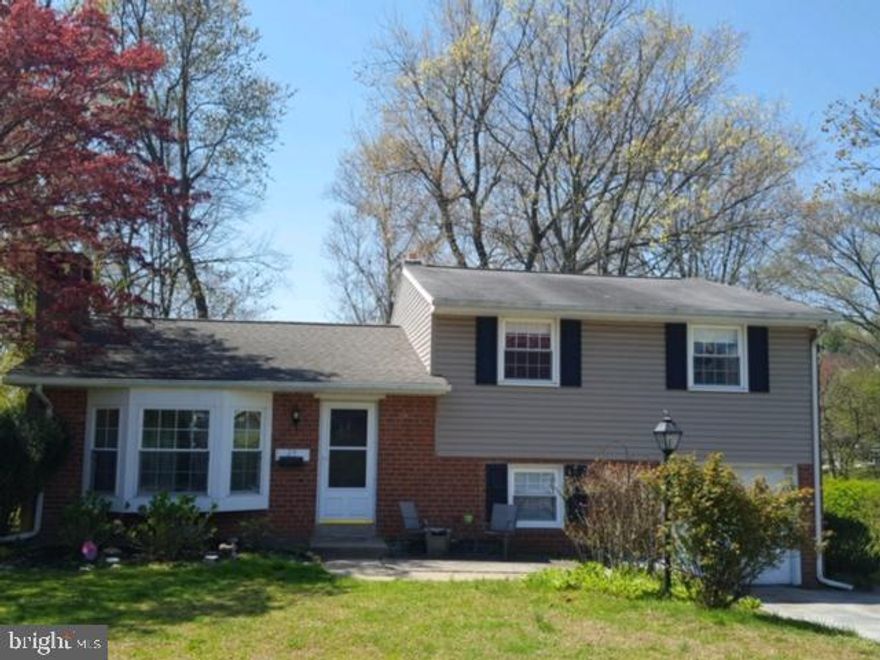 This beautiful split level home is waiting for your buyer!  Located in the desirable Rose Tree Woods neighborhood this home has so muchto offer!!!  Large living room with wood burning fireplace, formal dining room with entrance into a fabulous  3 season room overlooking a large level wooded yard. The updated eat in kitchen has a gas range and garbage disposal.  2nd level:  Spacious master bedroom, 2 additional bedrooms,full ceramic bath and entrance into a floored attic.  Lower level: finished family room with storage area, entrance into a one car attached garage, laundry area with powder room and outside entrance to the side yard.  Some extras include:  central air, replacement windows, ceiling fans, hardwood floors, low taxes, Marple Newtown School District...the list goes on!  Convenient to Rt 476, Rt.95 and the airport.  This home shows pride of ownership in every room!!!!