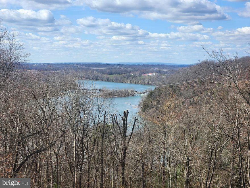 Multiple offers received.  Highest and best due by noon, March 13, 2024.  Welcome to your dream home! Nestled above the Shenandoah River with 3 bedrooms and 2 baths, this stunning property offers a rare opportunity to own a slice of paradise.   As you arrive, you'll be immediately captivated by the panoramic views of the river and surrounding mountains.   The home  was expertly remodeled in 2023 and exudes charm and character, with a blend of modern comforts and rustic elegance. Step inside to discover a spacious living area, complete with a cozy fireplace, creating a welcoming ambiance for gatherings with family and friends. The well-appointed kitchen has been recently updated with new appliances, ample storage, and a large island.  New flooring, new paint, new plumbing fixtures, new electric, new roof and new deck, name a few of the areas that have been updated in this beauty!  Outside, the expansive two level deck provides the perfect space for outdoor entertaining.  On the second level of the deck, relax in the hot tub while enjoying the scenic views. A gorgeous inground pool with pool house is available for cooling off on those hot days!  With endless opportunities for outdoor recreation right at your doorstep, including boating, swimming, and hiking, this property offers the ultimate retreat for those seeking an escape from the hustle and bustle of everyday life.   Don't miss your chance to own this extraordinary river view oasis.   Live here full-time, enjoy it as a vacation or 2nd home or use as an AirBNB!  All furniture and other personal property can be purchased as staged so you can move right in!!!  Property is located out of the flood plane.  Direct public river access is available close by.