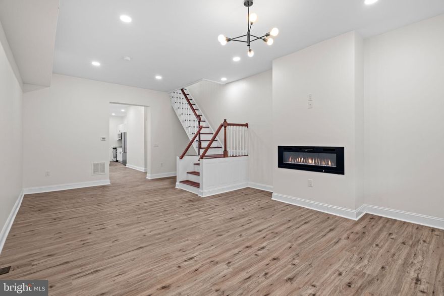 STUNNING 4 bedroom, 2 full bathroom town-home now available! Upon arrival, you'll notice a sleek facade, well kept block and an abundance of street parking on the exterior. From there, a free flowing open concept boasting all natural light, full bathroom, modern kitchen, dining and living room combination on the main level. Next, 4 bedrooms, full bathroom and tons of closet space upstairs. And finally, a fenced in rear yard and clean unfinished basement perfect for entertaining friends and family! Could it get any better though? It does! This home also has a new roof, hot water heater, hvac, electric, plumbing, windows, flooring and appliances throughout. In addition, its near all the public transportation you need to make the commute a breeze so hurry and make your appointment today before it's too late!