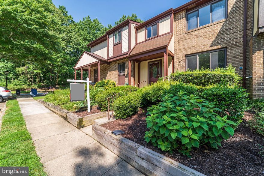 Just Renovated! Beautiful 3 Level Burke Centre Townhome. Brand new gourmet kitchen with custom cabinets and Premium quartz countertops; New SS GE appliances; fresh paint all throughout; New engineered  hardwood flooring on entire first floor; Recessed lighting; renovated master bath with custom vanity & quartz vanity top. New vanity with quartz top in second bath; New carpet on entire second floor.  Backs to trees; Walk out Unfinished Basement; 2 Assigned Parking Spaces