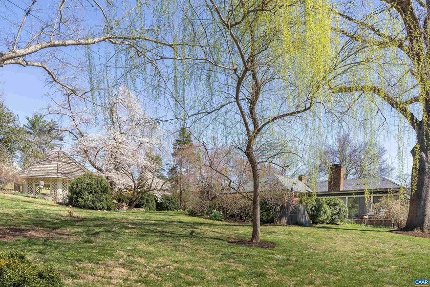 A remarkable property in Bellair.... Set on a 1.9 acre beautifully landscaped, elevated lot...Magnificent trees and grounds...Gracious and comfortable....Unique and gracious floor plan ...Living room(w/FP) and dining rooms with floor to ceiling walk-in bay windows, family room with fireplace opens, to the bright sunroom overlooking the stunning pool setting...Many custom features: copper gutters, slate roof, 2 sunrooms, circular driveway to the front entrance, lower driveway to the terrace level...Full terrace level with french doors open the family room has built-in bookcases, masonry fireplace, huge wet bar, room for a pool table, wide corridor to study, laundry room and playroom...,Fireplace in Family Room,Fireplace in Living Room,Fireplace in Rec Room,Fireplace in Study/Library