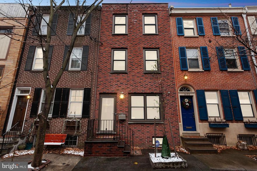 1630 Waverly Street. Location, location, location with GARAGE!! The property is in Center City Philadelphia, Rittenhouse square area, but tucked away on a quiet tree-lined street.This magnificent home is truly unique. Featuring a 1.5 car GARAGE with lots of room for storage, an electric garage door opener with access to rear street!! This historical property has been tastefully transformed into an ultra modern home. The property is divided into 2 parsels. The main home features 2 bedrooms, 2.5 bathrooms, office space, a great finished basement, private yard, security system, 6 surveillance cameras monitoring entire front and back of property. Step into the front door of the home, which features a beautiful living room with hardwood floors that leads to a gorgeous kitchen, perfect for entertaining guests, with a large bar top as well as stainless steel appliances, granite counter tops, open staircase, lots of cabinet space and tons of natural light shining through the sliding glass doors that leads to a private courtyard. The 2nd floor has 1 bedroom, 1 full bathroom with a jacuzzi tub and a sitting area which would make a great office space. The 3rd floor is a complete master suite with an open layout and a beautiful wall to wall marble tile bathroom. The basement is fully finished for additional living space, with  gorgeous slate tile, a 1/2 bathroom and a separate laundry/storage room. Walk out of the rear sliding glass doors through the courtyard which leads to a 2 story guest quarters. This large bi-level unit features a living room with hard wood floors, a kitchenette, 1 large bedroom with 2 spacious closets and a full bath. This rear unit would make a great In-Law suite or be perfect for overnight guests for privacy. This gem of a home is walking distance to lots of great shopping, fabulous restaurants, theaters, public transportation and much much more. A MUST SEE!