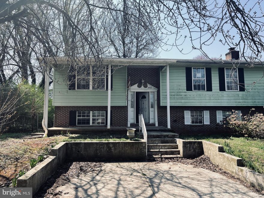 Wonderful chance to own this value priced home. in the sought after neighborhood of Catonsville Garden. This cozy custom built home has spacious room sizes, carpet floors and natural lighting.  The main level houses the living room, separate dining room with sliding door, nice sized kitchen with wood cabinets and bedrooms. The fully finished walkout basement has a large family room with wood burning fireplace, a full bath and another room that can be converted into a 4th bedroom. Relax and have fun on the rear patio or deck with great views of the wide rear yard. A convenient location, just few minutes away from shopping, schools and major roadways. This property may qualify for Seller Financing (Vendee).